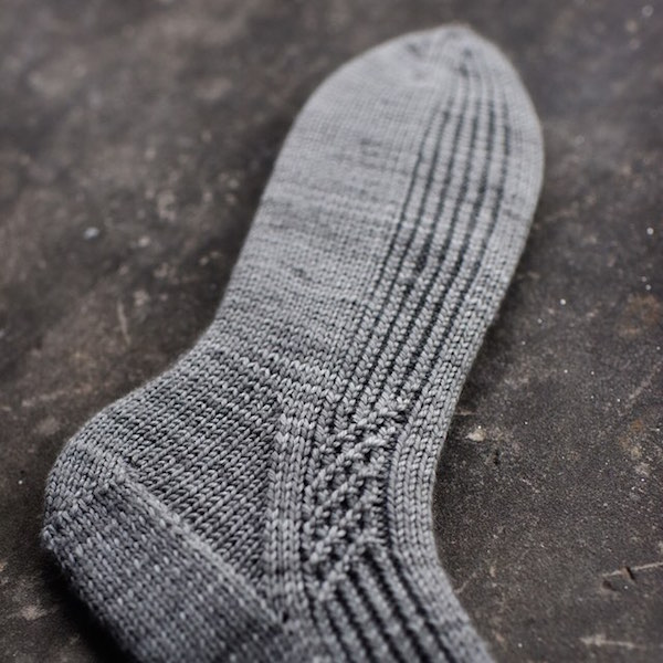 Gray cabled knit sock